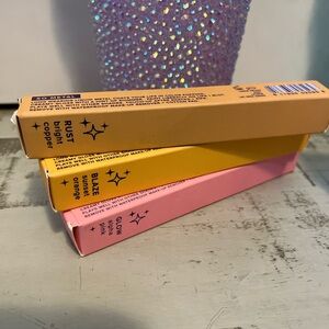 Set of Three Metallic Lip Glosses in Pink, Orange, and Copper